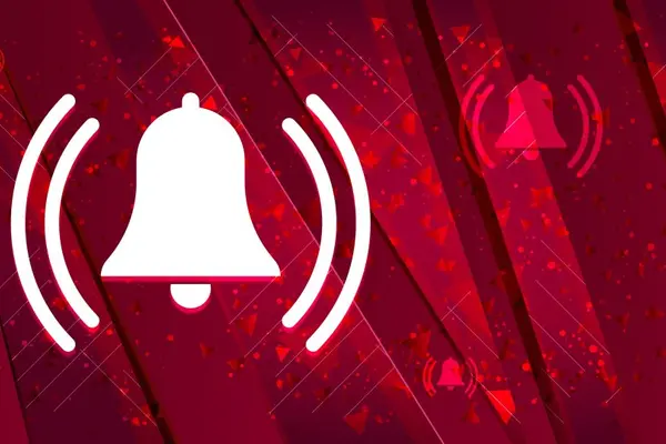 weiße Alarmglocke auf rotem Hintergrund
