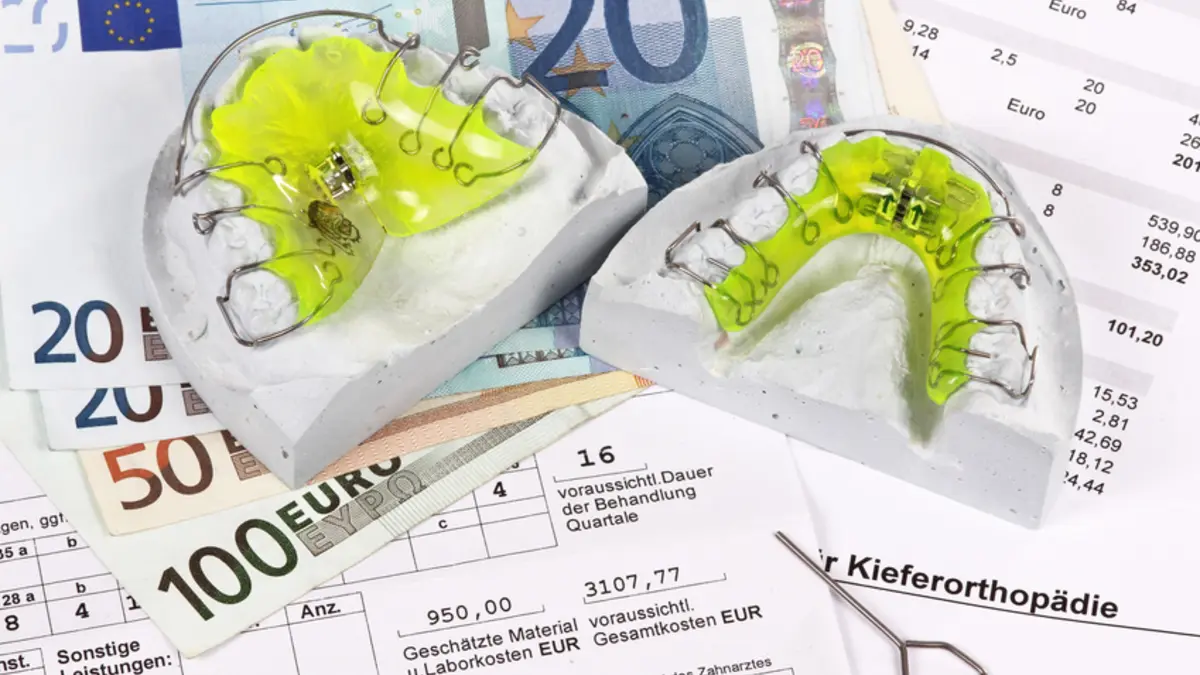 Zahnspangen und Geld