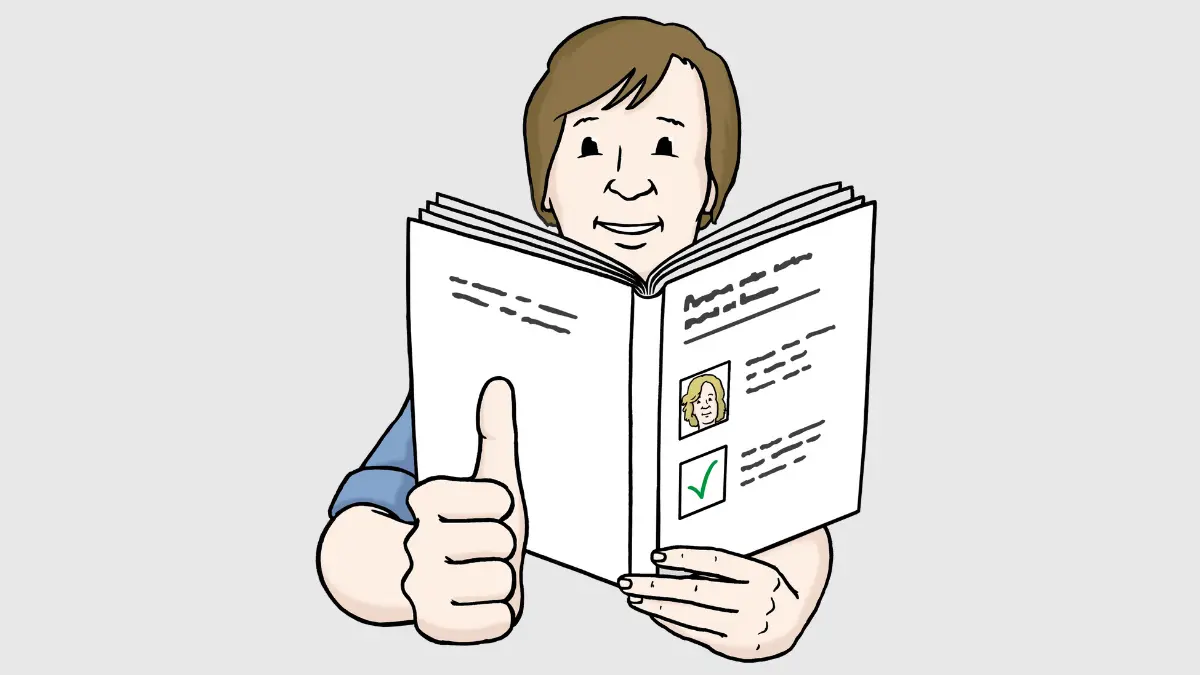 Eine Person hält ein Buch in der Hand und zeigt mit der rechten Hand Daumen hoch.