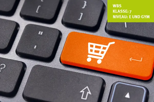 Computertastatur mit orangen Einkaufsbutton