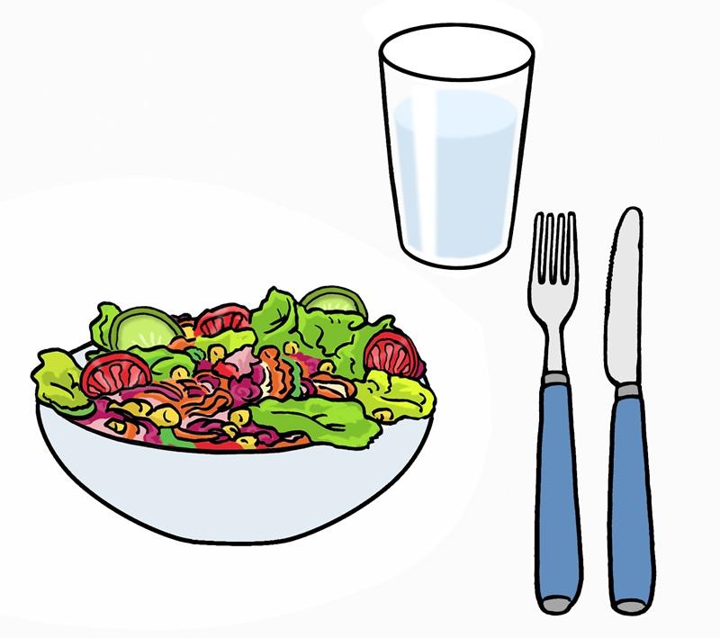 Salat mit Besteck und Glas