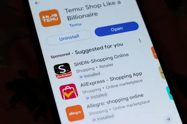 Nahaufnahmen Smartphone mit Shopping-Apps Temu, AliExpress, SHEIN