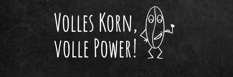 Schwarze Tafel auf der mit Kreise geschrieben ist: Volles Korn, volle Power. Daneben ist eine Comiczeichnung mit weißer Kreise von einem Getreidekorn.