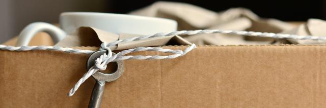 Umzugskiste mit Schlüssel