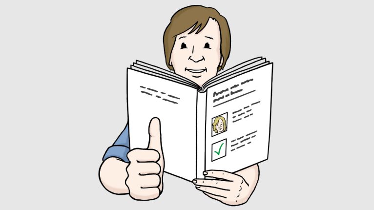 Eine Person hält ein Buch in der Hand und zeigt mit der rechten Hand Daumen hoch.