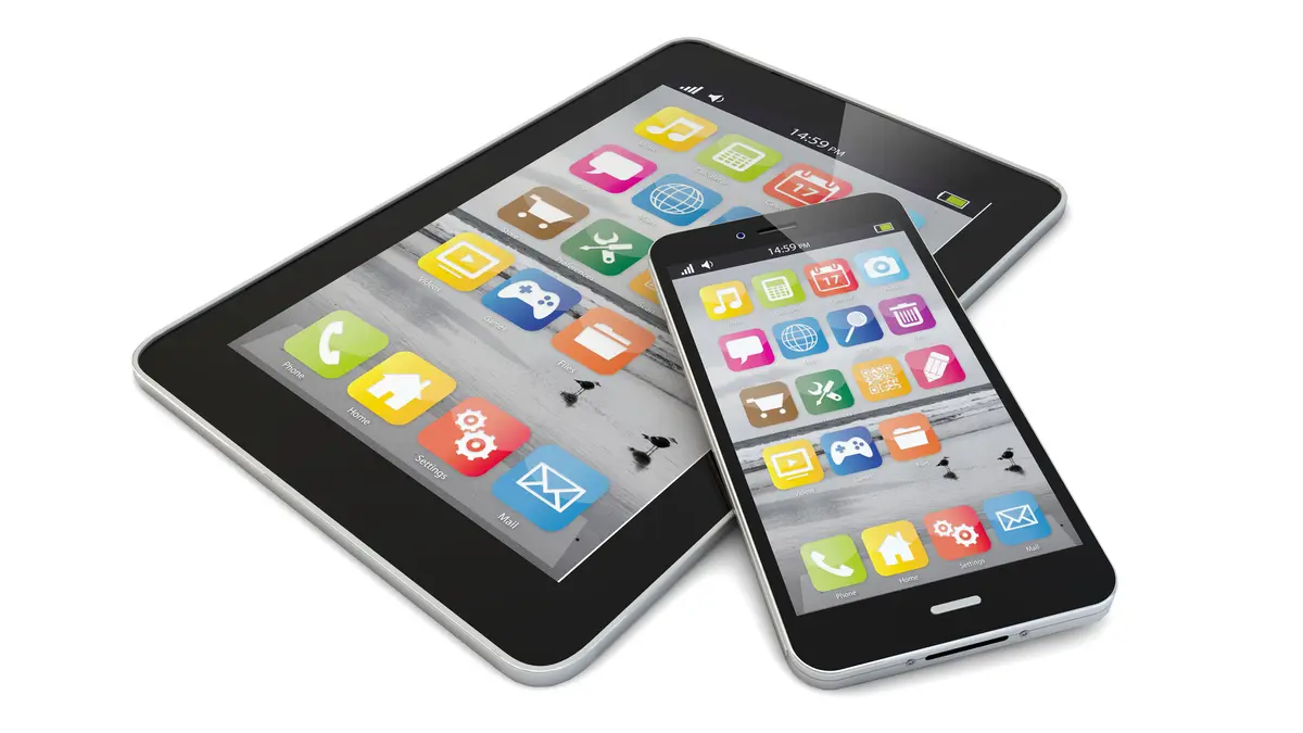Smartphone und Tablet mit Symbolen verschiedener Apps