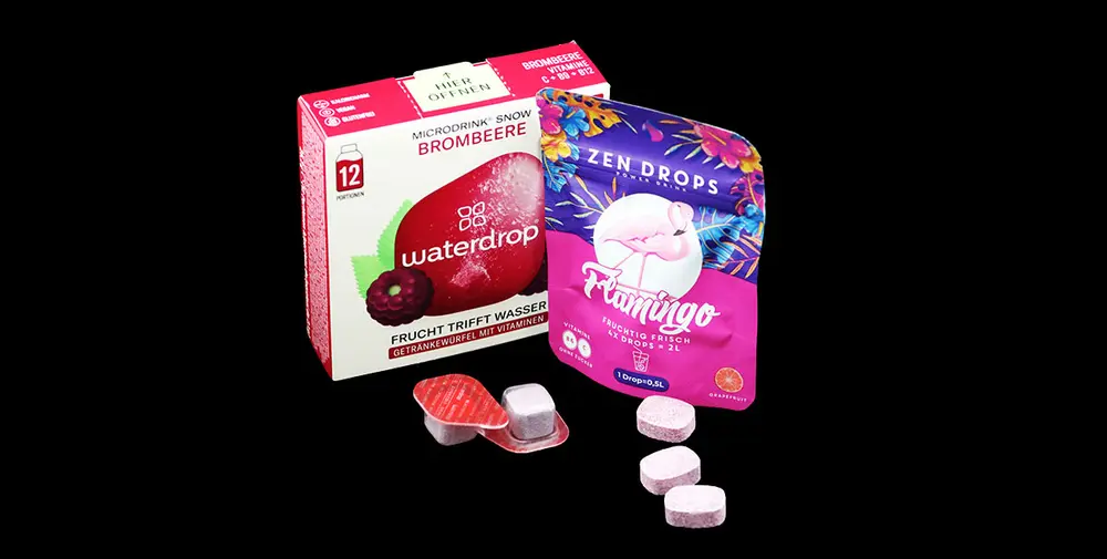 Zwei Produkte vor schwarzem Hintergrund