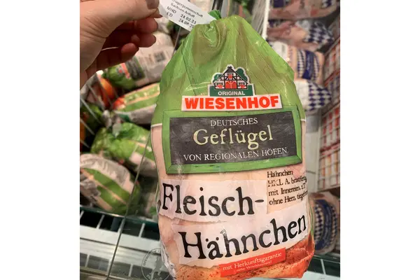 Bild eines Hähnches mit Regionalwerbung