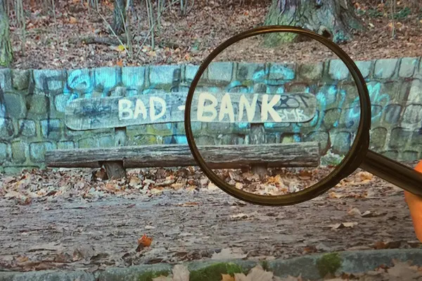 Parkbank mit Schriftzug Bad Bank