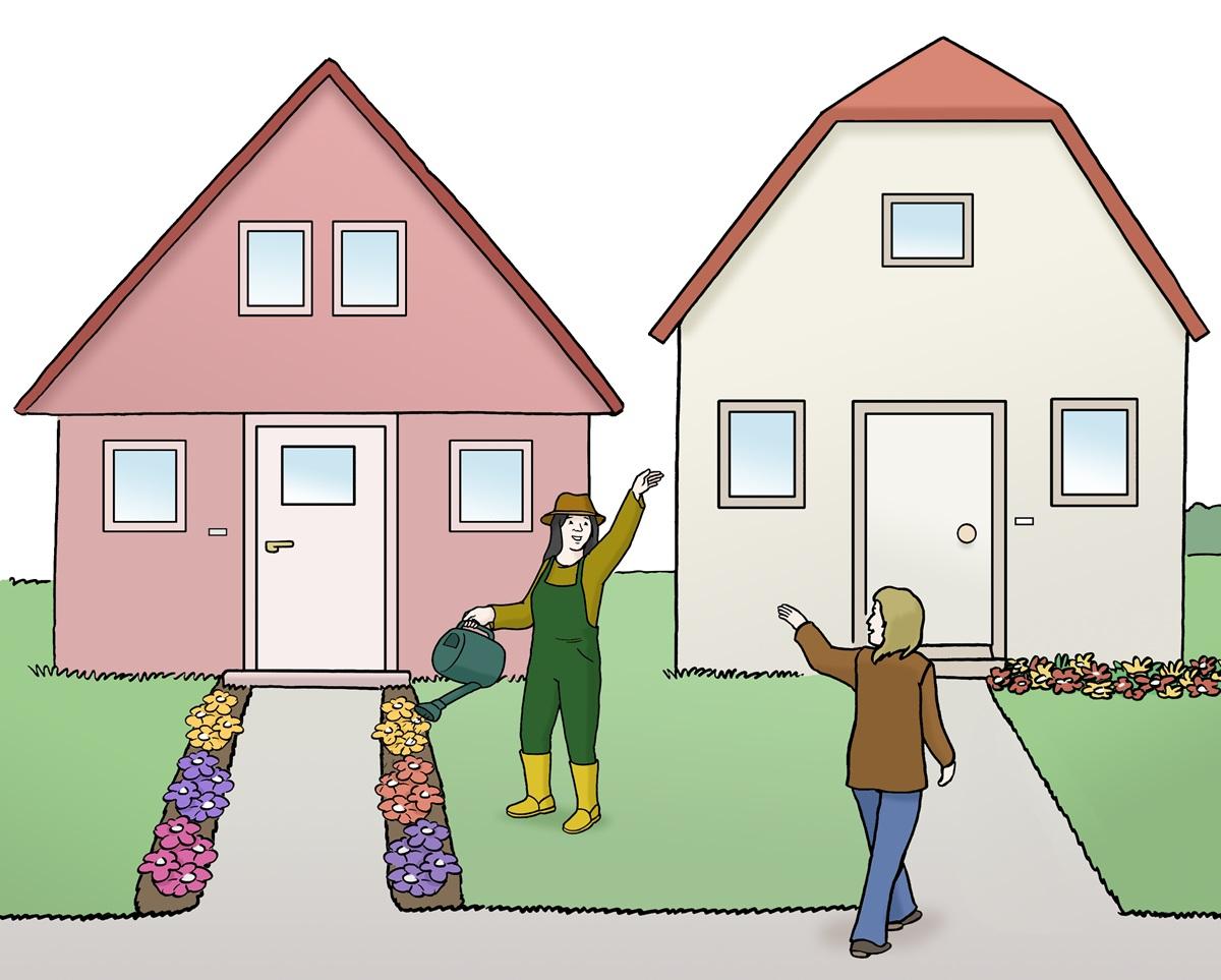 zwei Häuser mit zwei Menschen davor