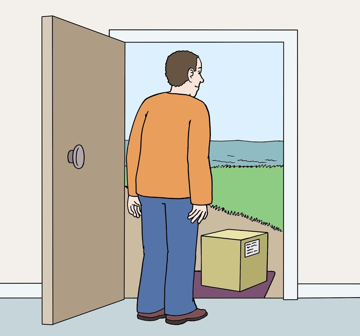 Mann an der Haustür mit Paket davor