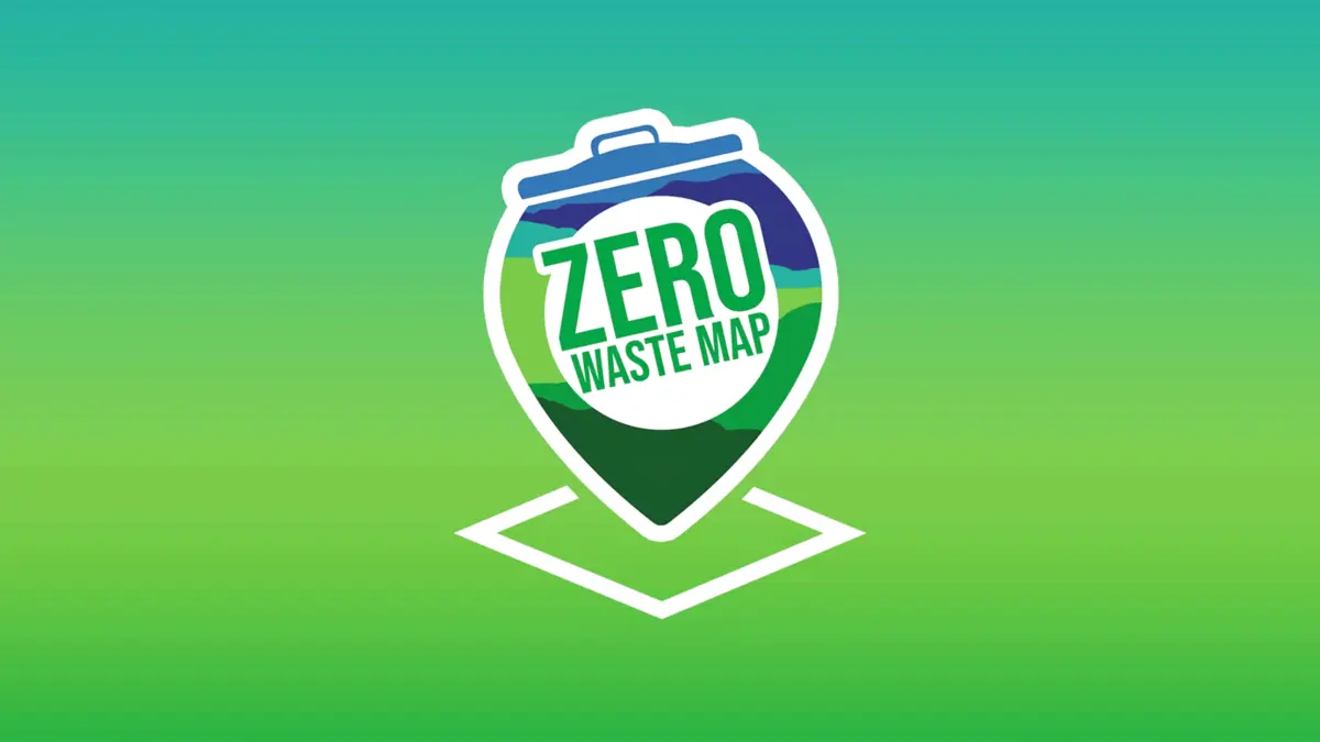 Illustration einer Kartenmarkierung mit Mülltonnendeckel und Schriftzug "Zero Waste Map" als Logo der gleichnamigen App