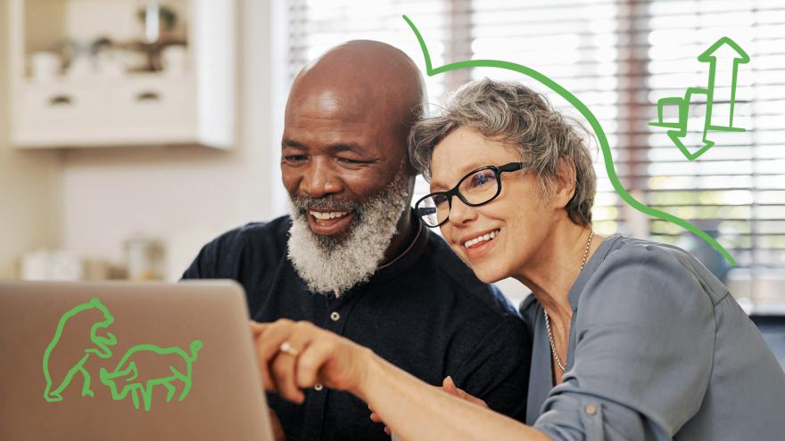 Schmuckbild: Mann und Frau schauen auf Laptop, die Frau zeigt auf etwas auf dem Bildschirm